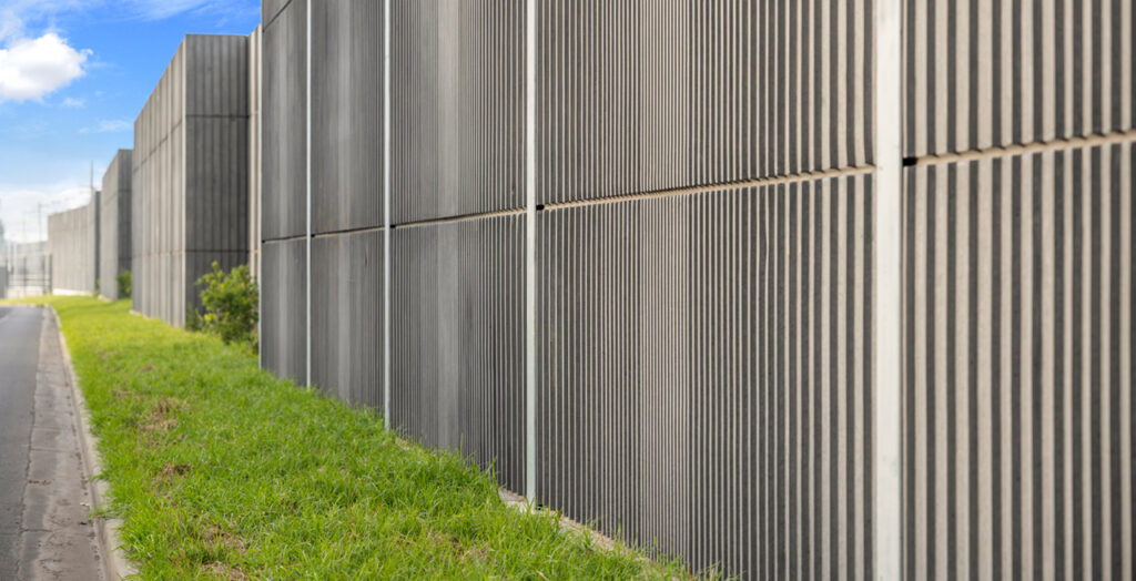 Moss Vale Completed noise wall showing pre-cast concrete panels and landscaping